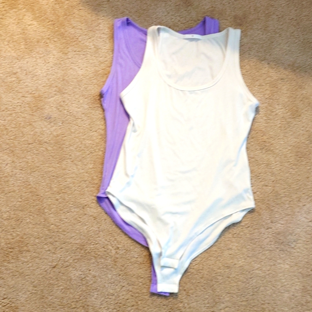 NWOT Purple and White tank bodysuits